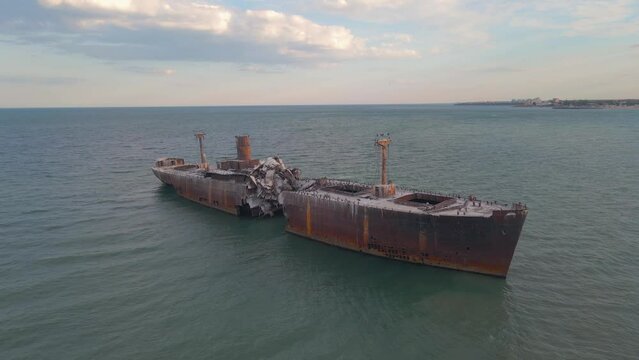 Drone footage of a rusty shipwreck at the Black Sea located next to Costinesti beach, in Romania. Aerial video was shot from a drone while flying forward and getting in close proximity to the wreck.