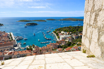 The port of Hvar (Dalmatia, Croatia) and the little islands in the Adriatic Sea in front of the...