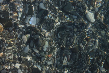 seabed with pebbles and clear water