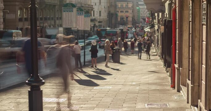 people walking on the street. 4k Time-lapse footage of people walking in Rome Italy at Sunset. Via del Tritone
