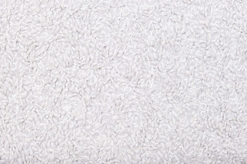 Beige woolen corpet rug texture abstract background