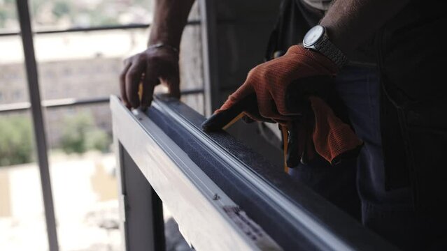 installation of a window in a house under construction