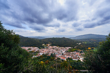 Fototapeta na wymiar Mountain village with cloudy skies