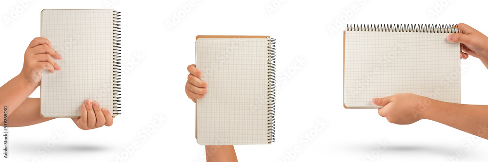 Wall mural empty notepad in hand. a hand holds a blank notepad with copy space, isolated on a white background.