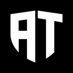 at letter logo with black background. at icon design with monogram shape. t font logo with sil shape. at text logo. t icon design. at icon design with letter. popular t. ta letter logo.