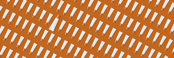 Creative seamless pattern of white cosmetic tubes on orange background. Cosmetics, skin care, beauty, body treatment concept. Creative design in flat lay style. Top view. Mock-up.
