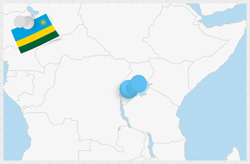 Map of Rwanda with a pinned blue pin. Pinned flag of Rwanda.