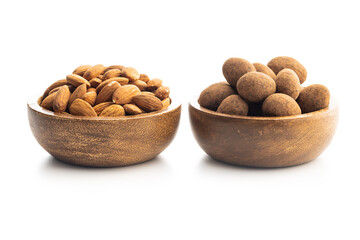 Almonds in chocolate coated in cocoa powder isolated in bowl on white background.