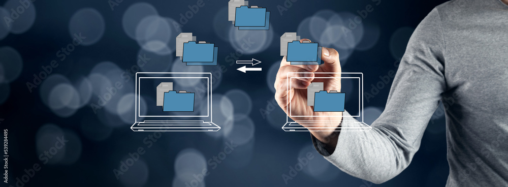 Aufkleber transferring files between laptops on a virtual screen.