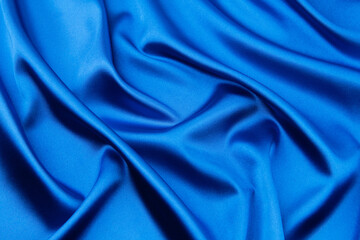 Blue satin or silk fabric as background