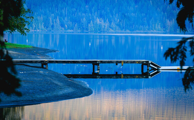 Quiet dock on lake early morning