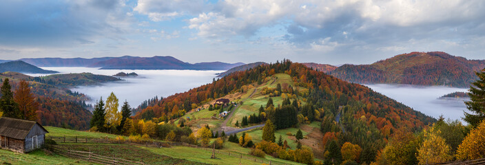 Foggy early morning autumn mountains scene. Peaceful picturesque traveling, seasonal, nature and countryside beauty concept scene. Carpathian Mountains, Ukraine. - obrazy, fototapety, plakaty
