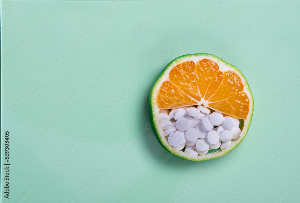 Wall mural vitamin c and pills, natural ways and pills, pills in lemon