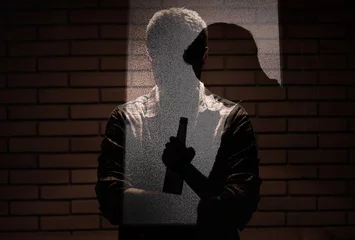Foto op Plexiglas silhouette of a person suffering from depression, alcohol addiction.  © kieferpix