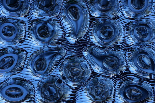 gray brack plastic texture from a piece of packaging with a pattern