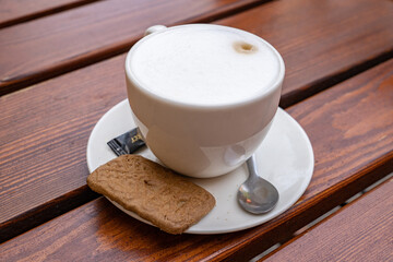 Cappuccino with a biscuit in Amsterdam