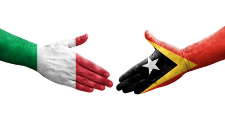 Handshake between Italy and Timor Leste flags painted on hands, isolated transparent image.