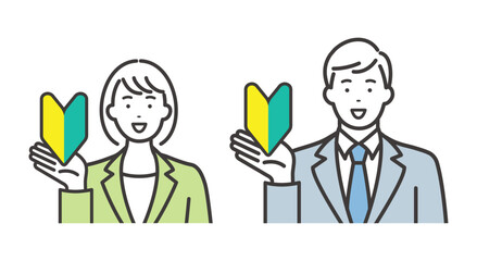日本の初心者マークを持つ男女の新入社員