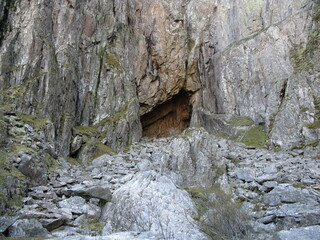 Entrance to the natural cave at Torghatten mountain seen below from the footpath.