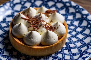 tiramisu dessert on a dish in a restaurant