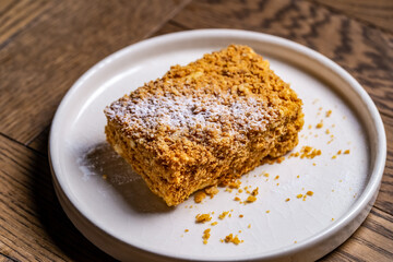 napoleon dessert on a dish in a restaurant