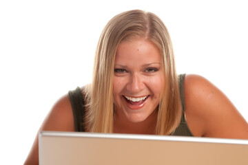 Attractive Woman Laughing While Using a Computer