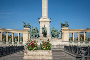 Fototapeta na wymiar Memorial Stone Cenotaph and Seven chieftains of the Magyars Sculptures at Millennium Monument at Heroes Square - Budapest, Hungary