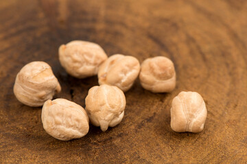 Chickpea or cicer arietinum  placed on an old wooden background.