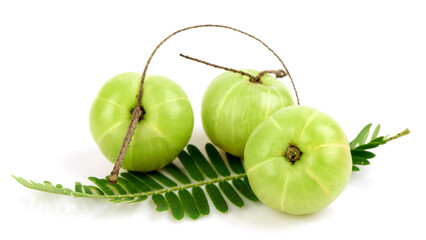 Indian Gooseberry or phyllanthus emblica fruits isolated on white background .