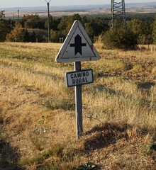 Rural traffic sign with text in spanish