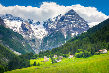 Obraz na płótnie Canvas Ortler and Stilfs village in Idyllic Passo dello Stelvio, South Tyrol alps