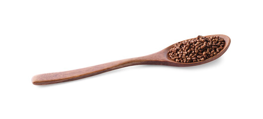 Wooden spoon with buckwheat tea granules on white background
