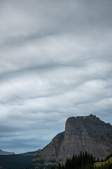 Billowy Clouds Over Heavy Runner Mountain In Glacier