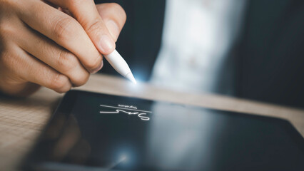 Paperless workplace and Digital Signature or e-signature concept. Businessman using stylus e-pen...