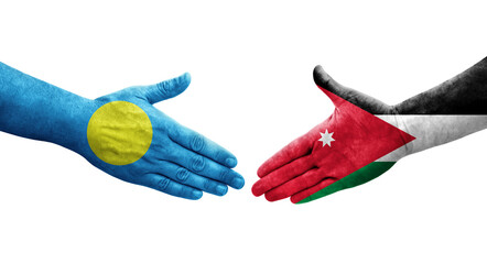 Handshake between Jordan and Palau flags painted on hands, isolated transparent image.