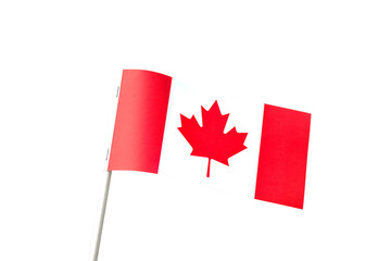 Small Canadian flag on a stick isolated cutout