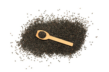 Heap of black sesame seeds on white background