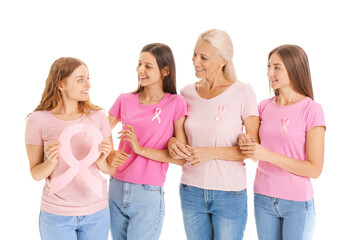 Beautiful women with pink awareness ribbons on white background. Breast cancer concept