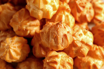 Delicious eclairs as background, closeup