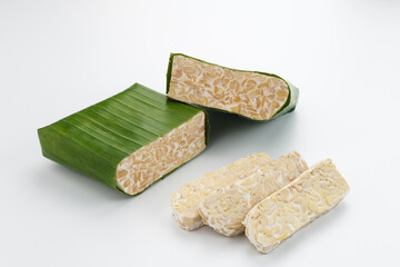 Raw Tempeh, Tempeh or Tempe, Indonesian traditional food, made from fermented soybeans. Usually fried for a side dish or for other cooking ingredients.
