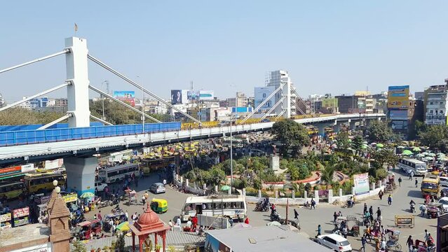 modern city construction with heavy traffic and bright blue sky at morning