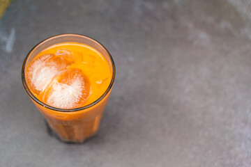 Traditional Thai iced tea. Thai tea famous beverage drink traditional in Thailand, empty space for text.