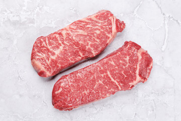 Prime marbled beef steaks. Raw striploin steak