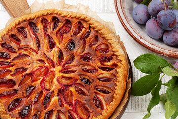 Homemade plum pie. Fruit tart with seasonal fruits