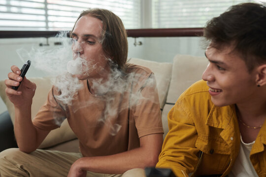Young Man Smoking Vape