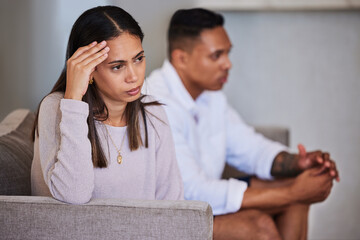 Divorce, sad and fight with couple on sofa with marriage problems feeling frustrated, conflict or...