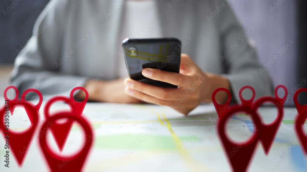 Poster person using map with red location markers