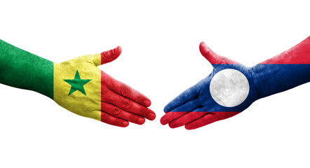 Handshake between Laos and Senegal flags painted on hands, isolated transparent image.
