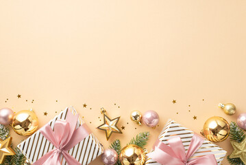 New Year concept. Top view photo of big present boxes with bows gold and pink baubles star ornaments fir branches in snow and confetti on isolated light beige background with blank space