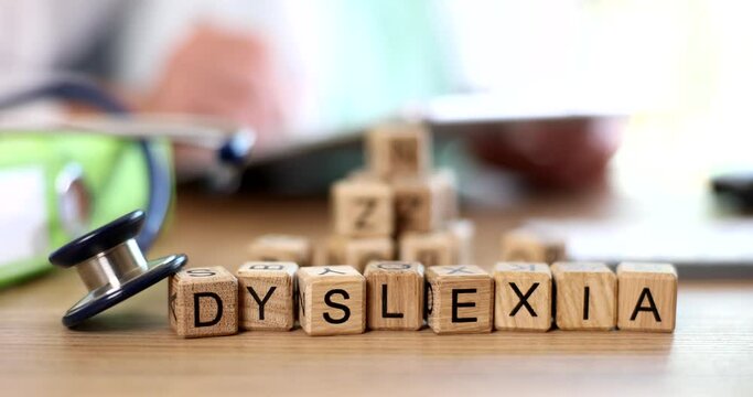 Text with diagnosis of dyslexia and stethoscope and medical